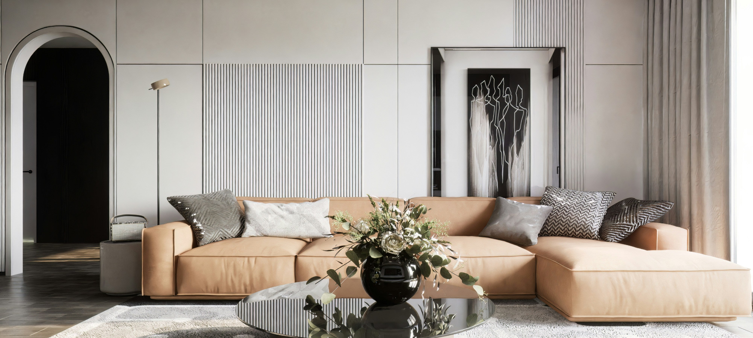 Modern living room with a beige sectional sofa, decorative pillows, and a coffee table.