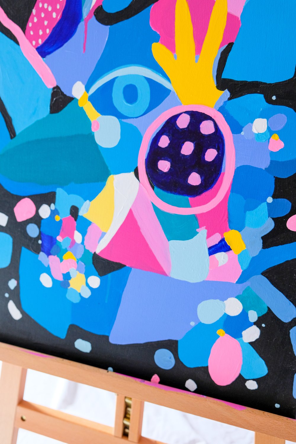 Colorful and energetic acrylic painting details titled "Celebration" by Carina Dawn, capturing joy and expression.