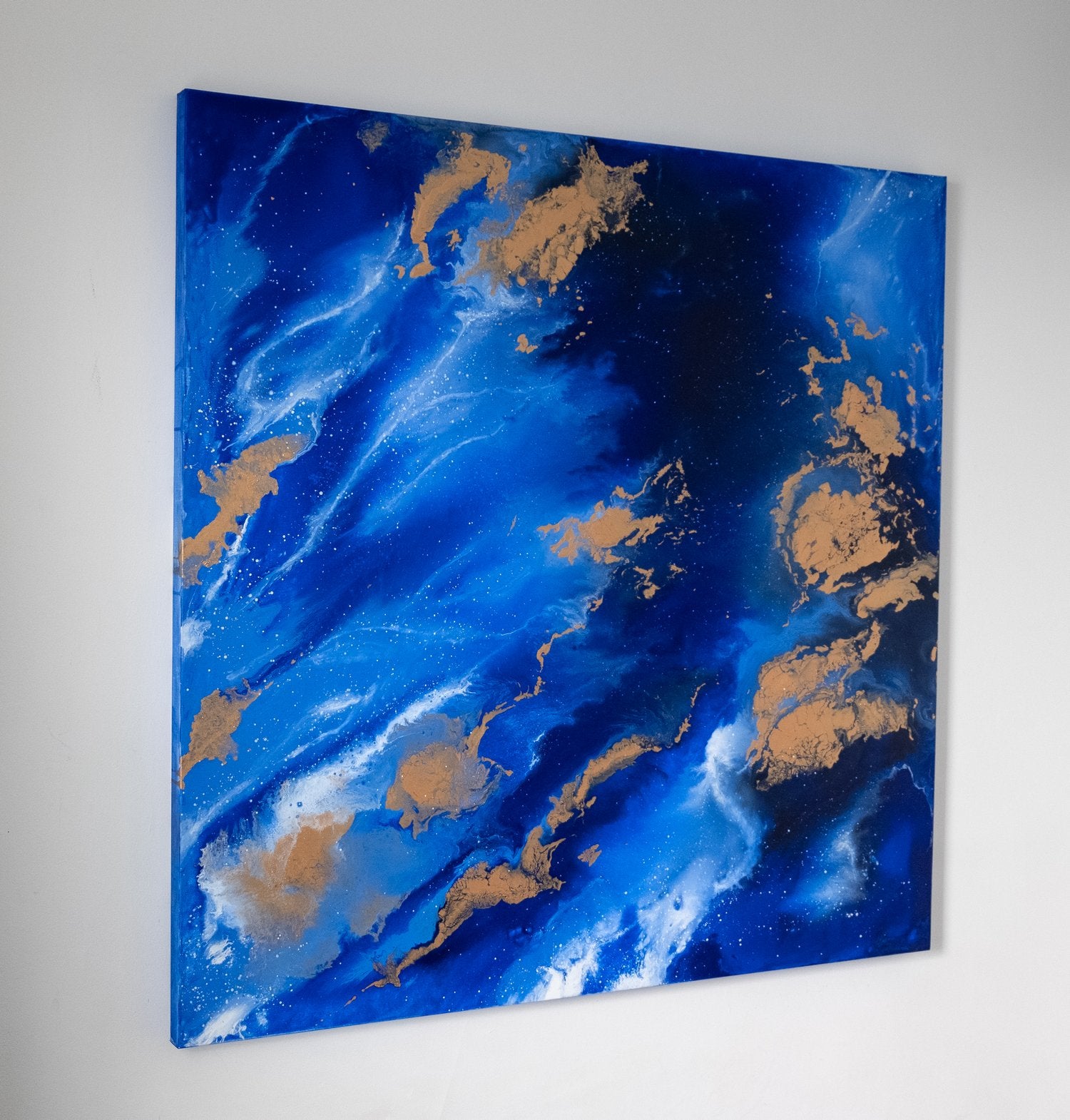 “Enlightenment” by Carina Dawn, a contemporary abstract acrylic painting with luminous gold and blue colors.